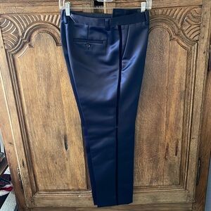 Navy pant. Feels like SATIN but is 100 polyester and cotton, 70 rayon, 30 nylon